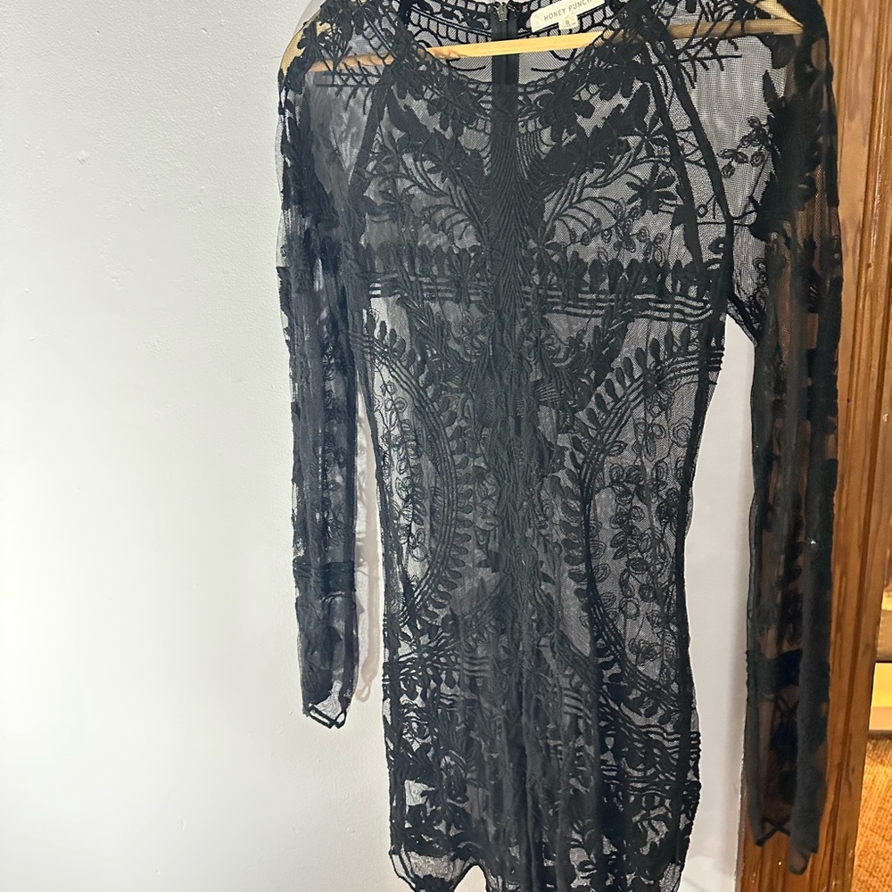 Black long sleeve hand detailed dress